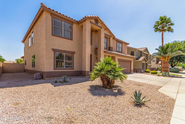 11511 E Renata Ave, Mesa, AZ 85212 - view of front facade with driveway, stucco siding, an attached garage, and a tiled roof