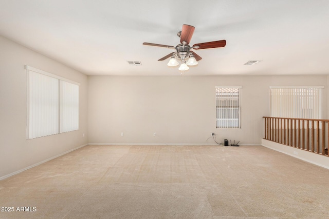11511 E Renata Ave, Mesa, AZ 85212 - empty room with a ceiling fan, light carpet, and baseboards