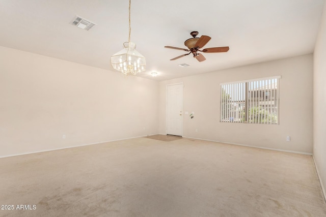 11511 E Renata Ave, Mesa, AZ 85212 - empty room featuring light carpet, a chandelier, baseboards, and ceiling fan