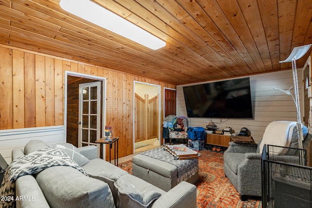 living room with wood walls and wooden ceiling