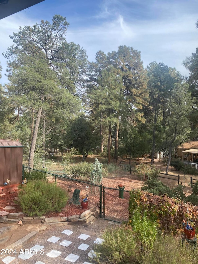 view of yard featuring a gate and fence