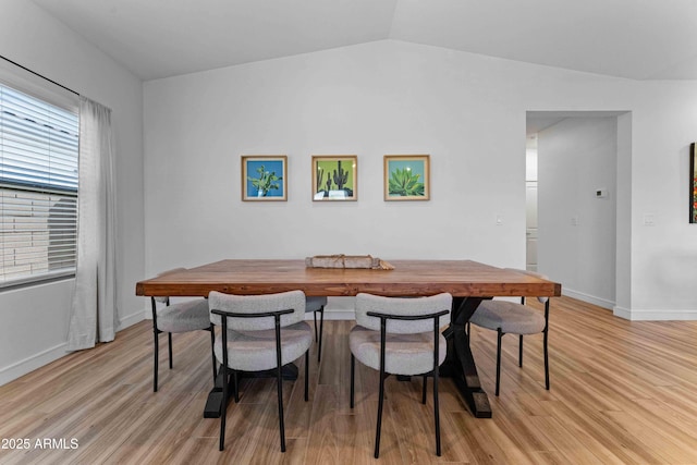 27510 N 30th Ln, Phoenix, AZ 85083 - dining space with vaulted ceiling, light wood finished floors, and baseboards