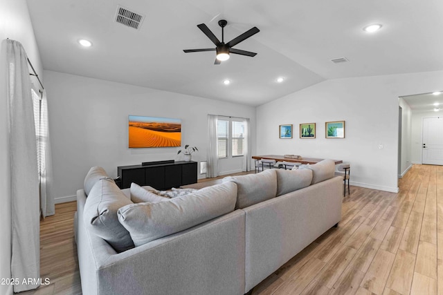 27510 N 30th Ln, Phoenix, AZ 85083 - living room featuring lofted ceiling, ceiling fan, light wood-type flooring, baseboards, and recessed lighting