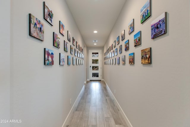 hallway featuring light hardwood / wood-style floors