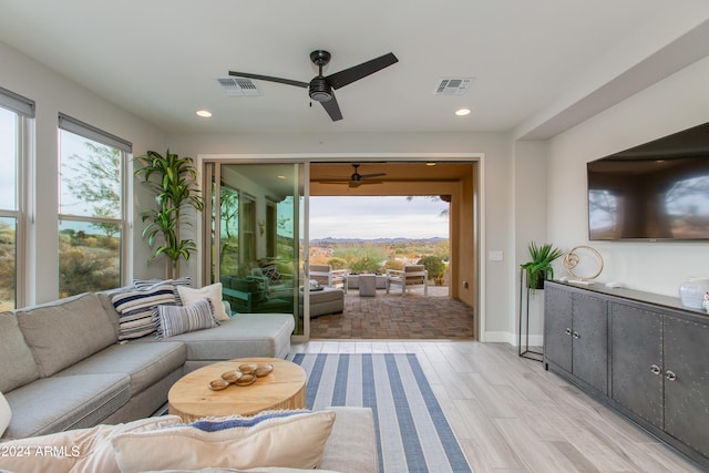 interior space featuring a wealth of natural light and light hardwood / wood-style floors