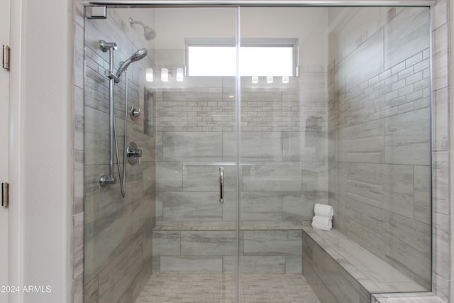 bathroom featuring walk in shower