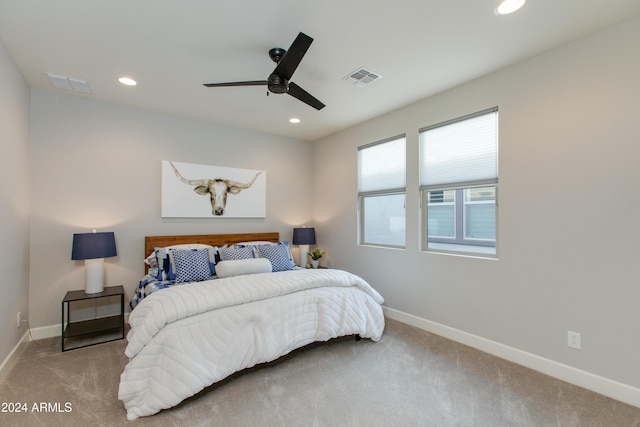 carpeted bedroom with ceiling fan