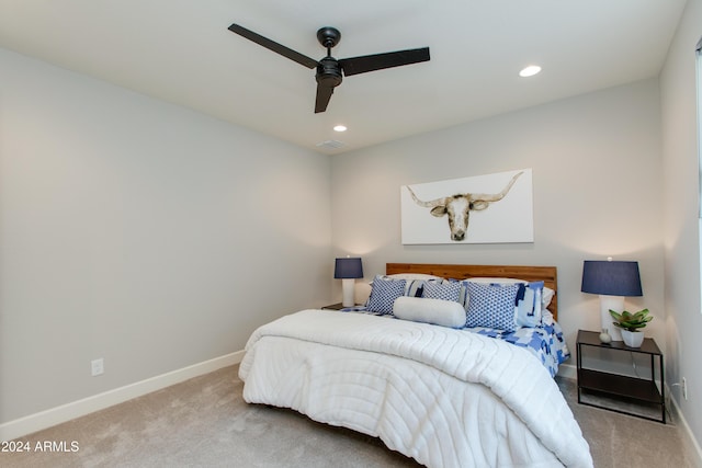 carpeted bedroom featuring ceiling fan