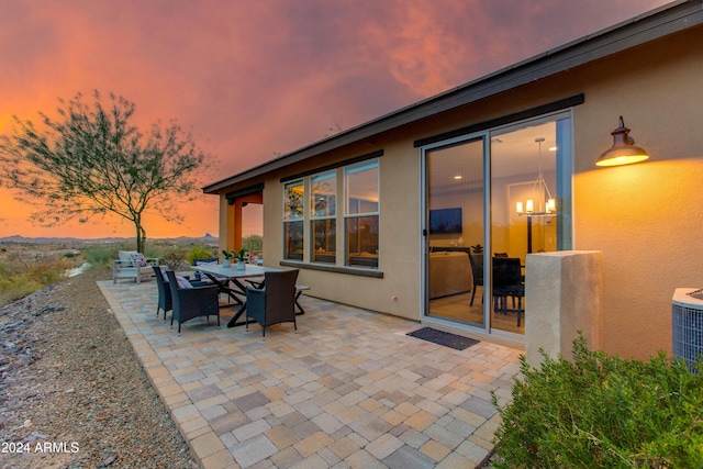 patio terrace at dusk with cooling unit