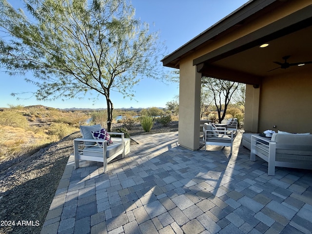 view of patio featuring ceiling fan and an outdoor hangout area