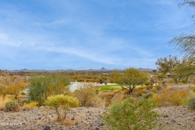 view of mountain feature with a water view