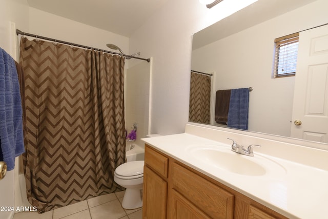 full bathroom with toilet, vanity, tile patterned floors, and shower / tub combo with curtain