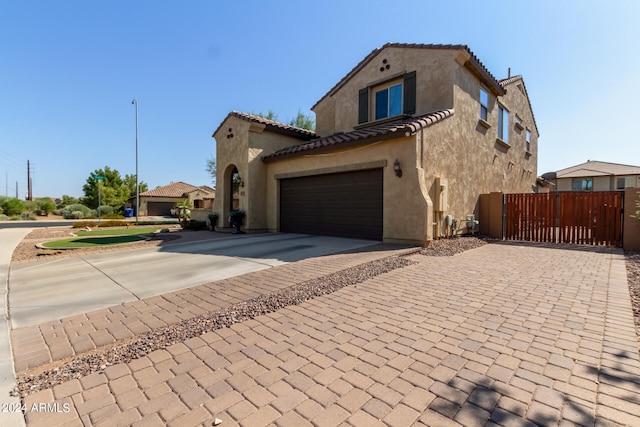 view of property exterior with a garage