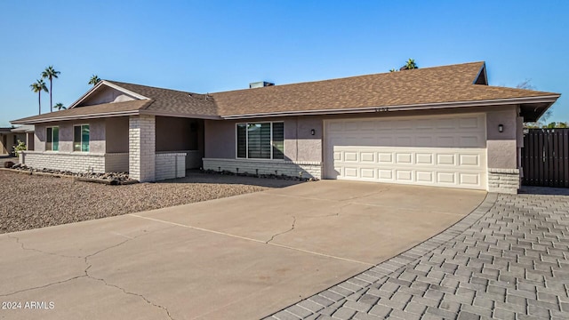 ranch-style house with a garage