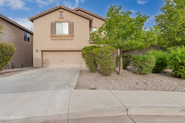 view of front of property featuring a garage