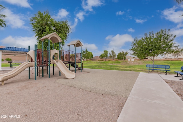 view of jungle gym featuring a yard