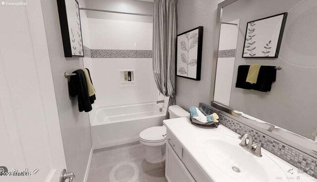 full bathroom featuring tile patterned flooring, toilet, shower / tub combo with curtain, and vanity