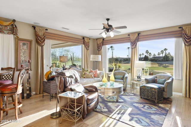 interior space featuring ceiling fan and light hardwood / wood-style floors