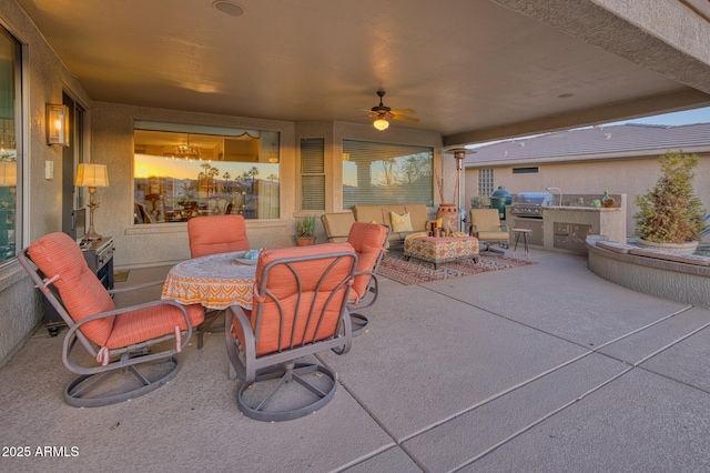 view of patio / terrace featuring area for grilling and ceiling fan