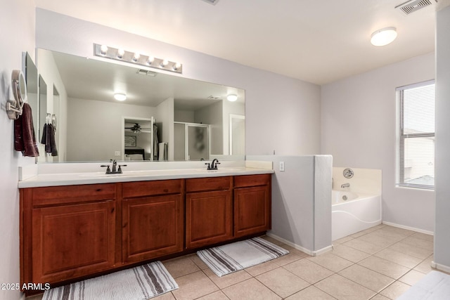 bathroom featuring vanity, separate shower and tub, tile patterned floors, and ceiling fan