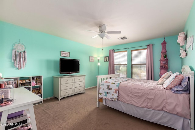 bedroom with ceiling fan and carpet floors