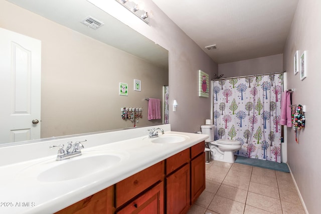 full bathroom featuring tile patterned flooring, vanity, toilet, and shower / bath combo with shower curtain