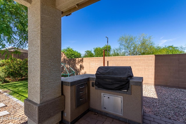 view of patio with area for grilling