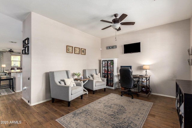 office area featuring ceiling fan and dark hardwood / wood-style flooring