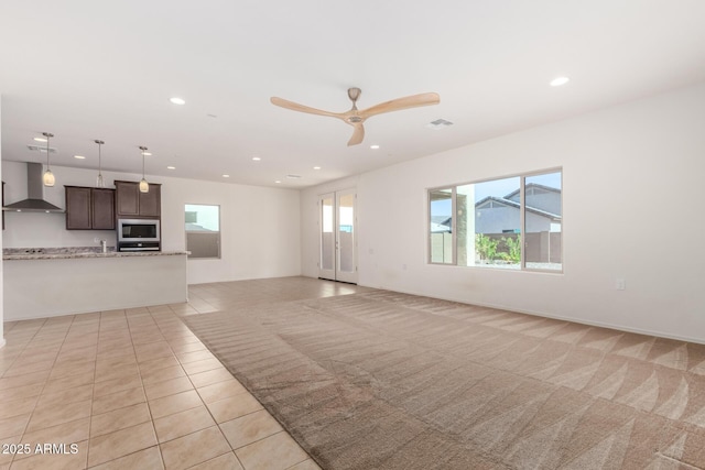 6331 W Desert Blossom Way, Florence, AZ 85132 - unfurnished living room with recessed lighting, a ceiling fan, light tile patterned flooring, and baseboards