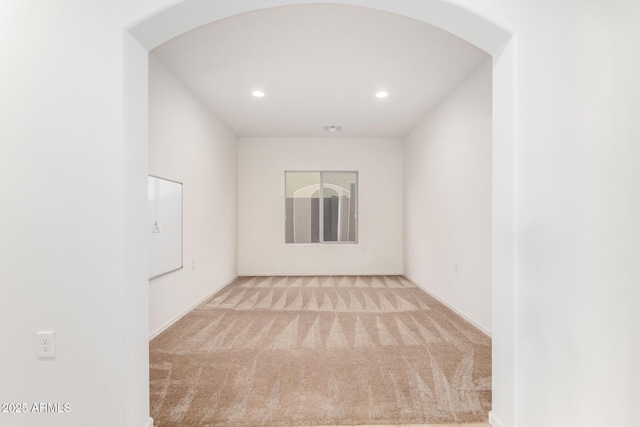 6331 W Desert Blossom Way, Florence, AZ 85132 - empty room with carpet flooring, recessed lighting, arched walkways, and baseboards