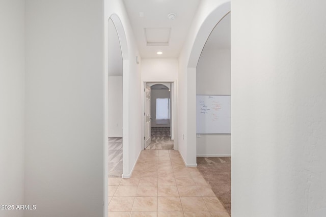6331 W Desert Blossom Way, Florence, AZ 85132 - corridor featuring arched walkways and light tile patterned flooring