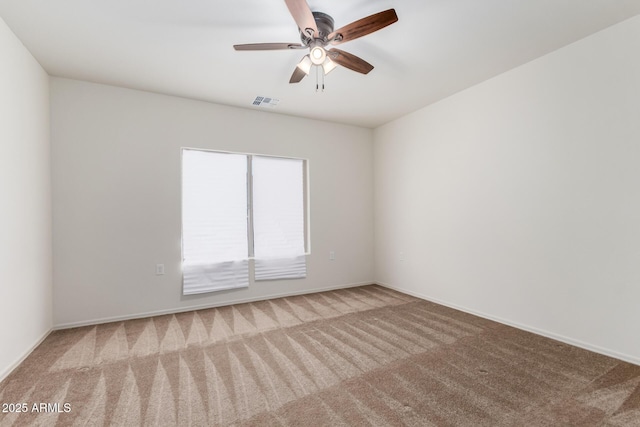 6331 W Desert Blossom Way, Florence, AZ 85132 - carpeted empty room featuring ceiling fan and baseboards