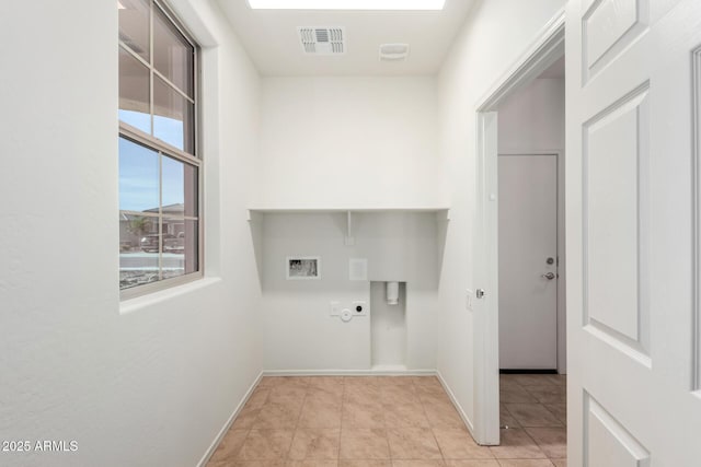 6331 W Desert Blossom Way, Florence, AZ 85132 - laundry room with electric dryer hookup, hookup for a washing machine, baseboards, and light tile patterned floors