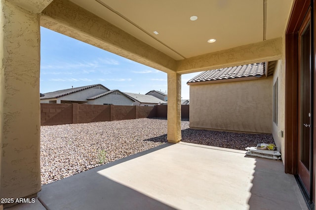 6331 W Desert Blossom Way, Florence, AZ 85132 - fenced backyard featuring a patio
