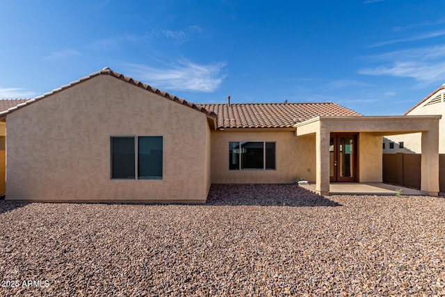 6331 W Desert Blossom Way, Florence, AZ 85132 - rear view of house featuring stucco siding, a patio, and a tiled roof