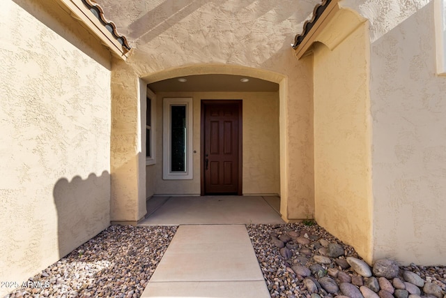 6331 W Desert Blossom Way, Florence, AZ 85132 - property entrance with stucco siding