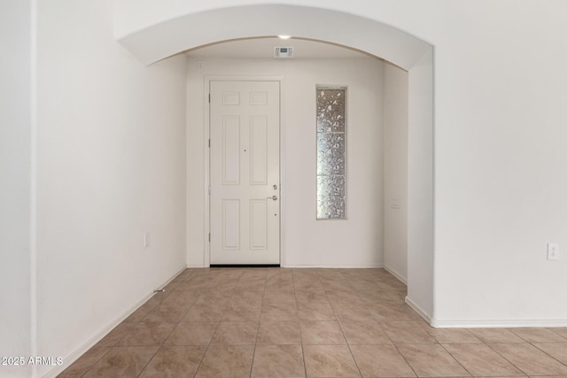6331 W Desert Blossom Way, Florence, AZ 85132 - entrance foyer featuring arched walkways and light tile patterned floors