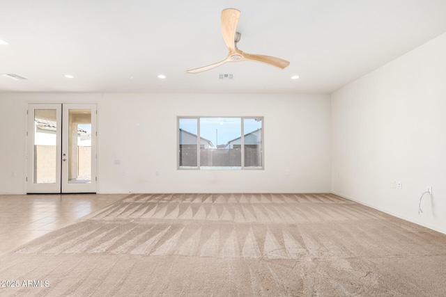 6331 W Desert Blossom Way, Florence, AZ 85132 - empty room featuring recessed lighting, carpet floors, baseboards, ceiling fan, and french doors