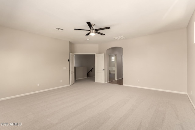 17419 W Elaine Dr, Goodyear, AZ 85338 - carpeted empty room featuring arched walkways and a ceiling fan