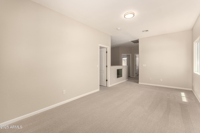 17419 W Elaine Dr, Goodyear, AZ 85338 - unfurnished living room with light colored carpet and baseboards
