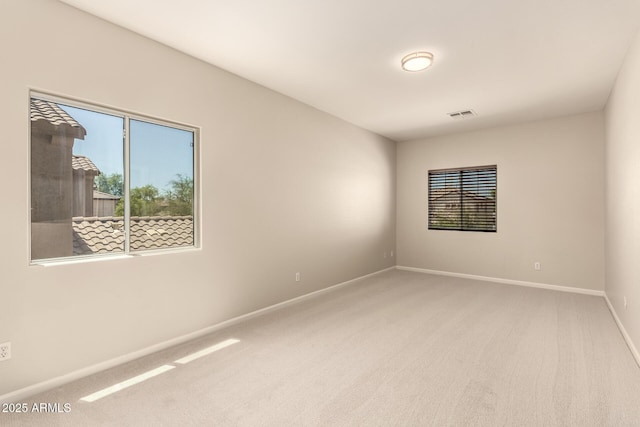 17419 W Elaine Dr, Goodyear, AZ 85338 - carpeted empty room with plenty of natural light