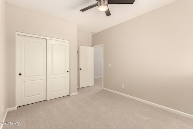 17419 W Elaine Dr, Goodyear, AZ 85338 - unfurnished bedroom featuring light colored carpet, a closet, and a ceiling fan