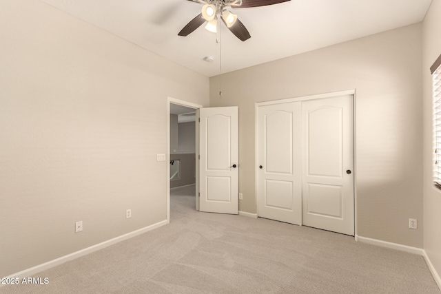 17419 W Elaine Dr, Goodyear, AZ 85338 - unfurnished bedroom featuring light colored carpet, a closet, and a ceiling fan