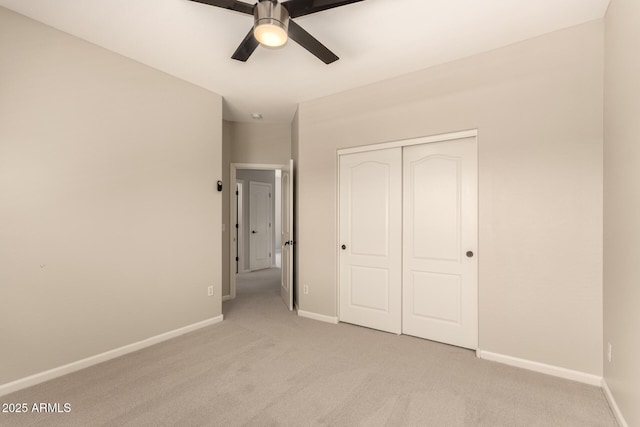 17419 W Elaine Dr, Goodyear, AZ 85338 - unfurnished bedroom with light colored carpet, a closet, and a ceiling fan