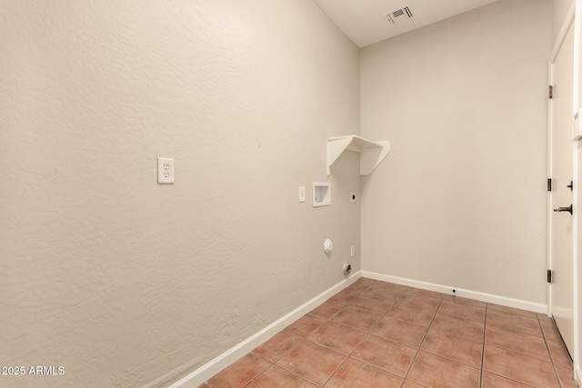 17419 W Elaine Dr, Goodyear, AZ 85338 - washroom featuring hookup for an electric dryer, hookup for a gas dryer, light tile patterned flooring, and washer hookup