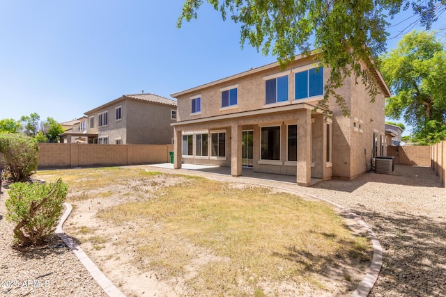 17419 W Elaine Dr, Goodyear, AZ 85338 - back of property featuring stucco siding, a fenced backyard, and a patio area