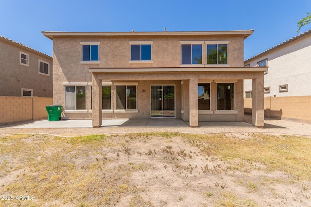 17419 W Elaine Dr, Goodyear, AZ 85338 - back of house with stucco siding, a patio area, and a fenced backyard