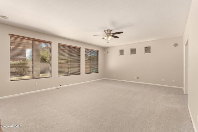 17419 W Elaine Dr, Goodyear, AZ 85338 - spare room with ceiling fan and light carpet