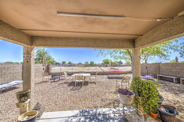 23993 N Desert Dr, Florence, AZ 85132 - view of patio / terrace featuring outdoor dining area and a fenced backyard