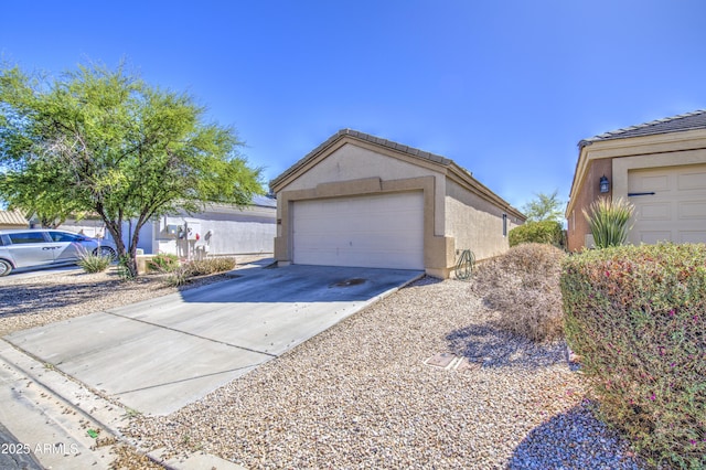 23993 N Desert Dr, Florence, AZ 85132 - garage featuring concrete driveway